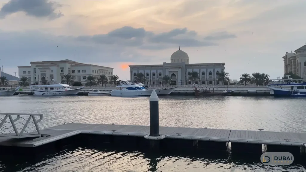 Boats moored along the waterfront near Flag Island at dusk