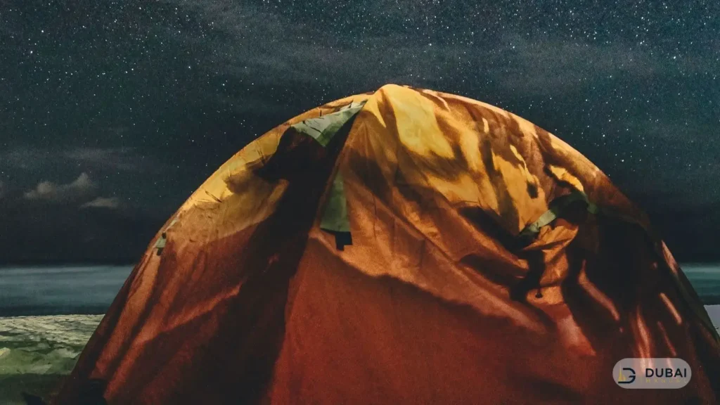 Camping tent under the stars at the beach