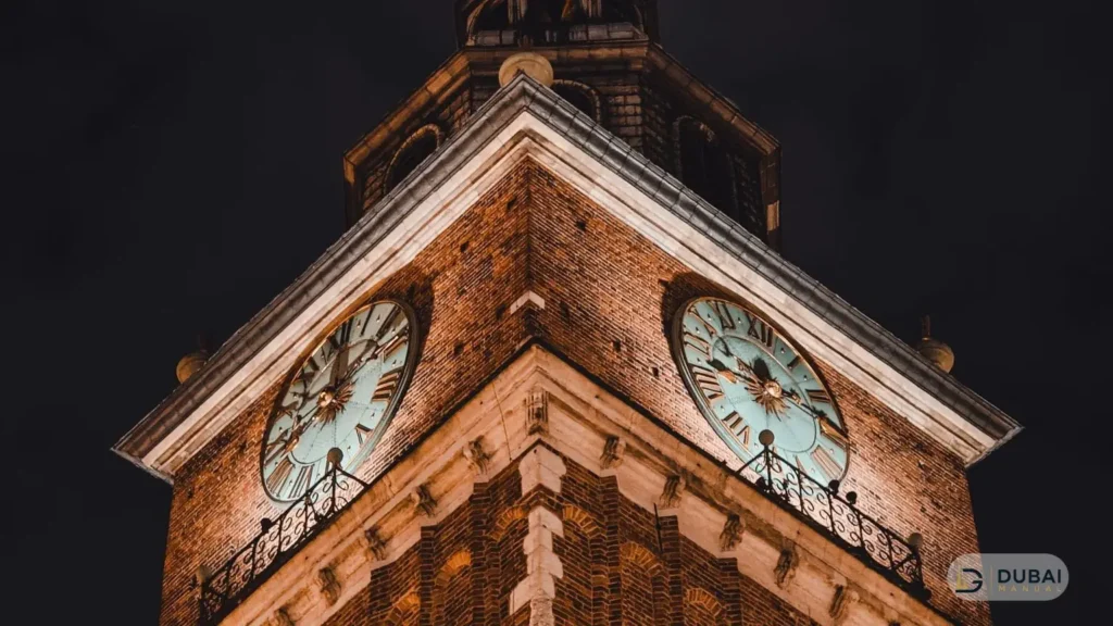 Clock tower lit up at night
