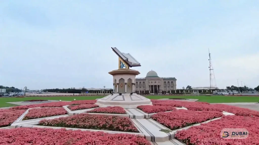 Close view of the open-book Holy Quran monument in Sharjah