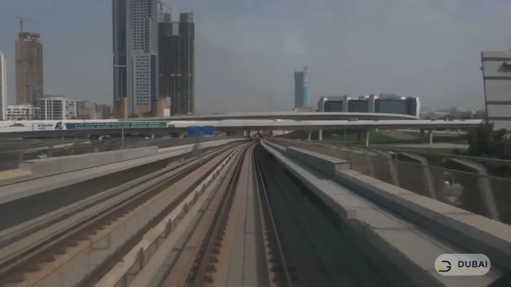 Elevated Dubai Metro tracks with city skyline