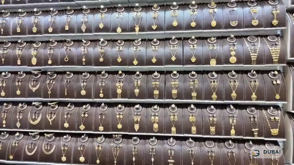Gold necklace and pendant displays at Ajman Gold Souq