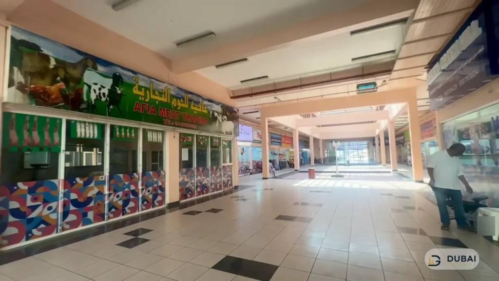 Interior corridor of Karama market with shopfronts