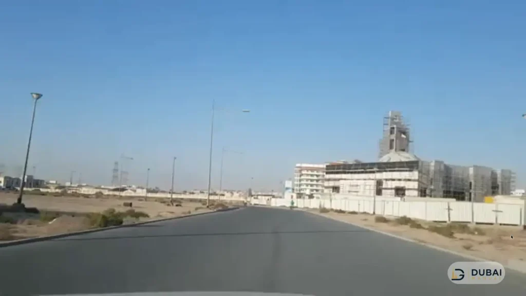 Mosque under construction on a street in International City Phase 2