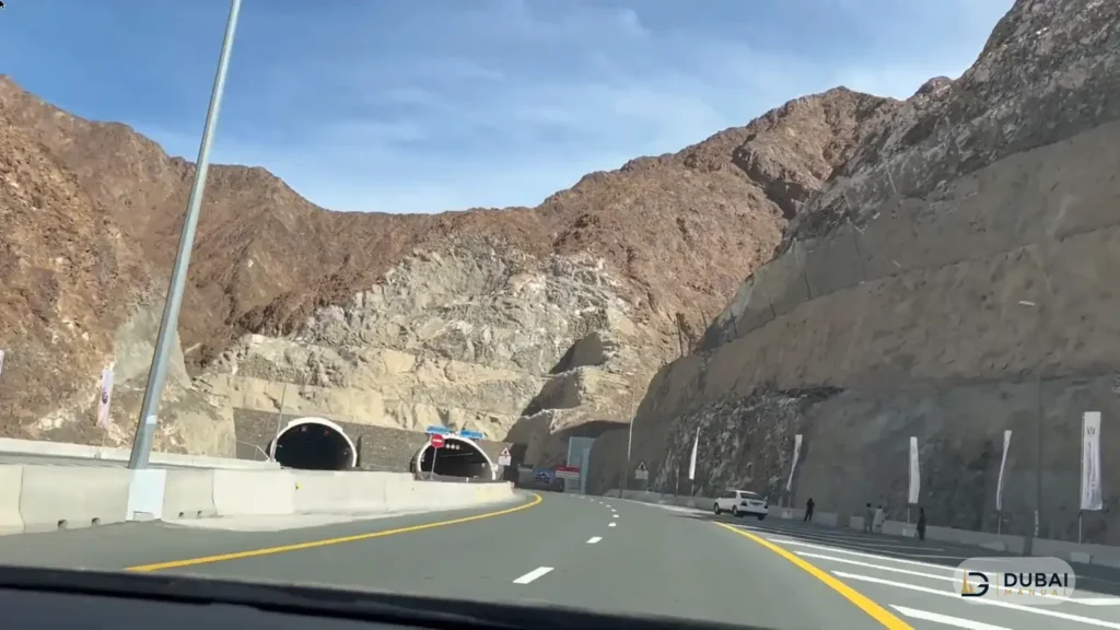 Mountain road with tunnel portals on the Khorfakkan road near Shees Rest Area