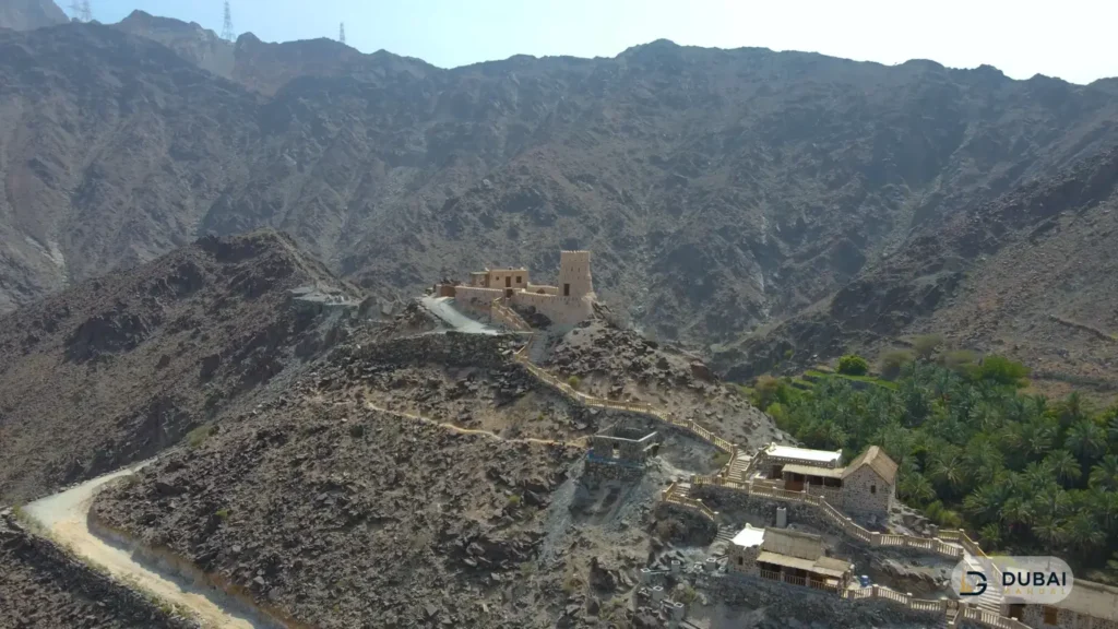 Najd Al Maqsar Village aerial view with fortress and palm groves