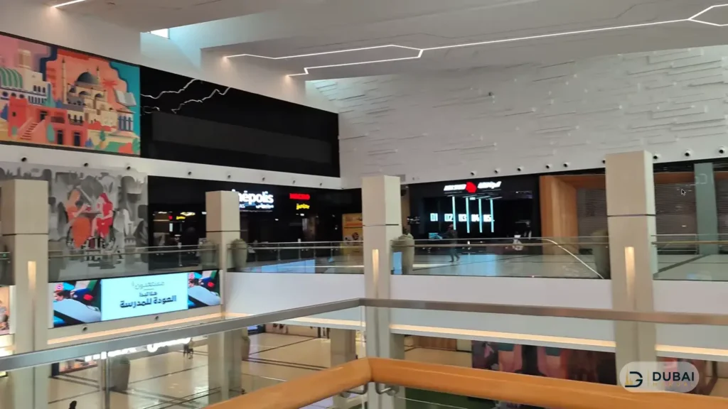 Oasis Mall Sharjah interior corridor with Sharjah mural