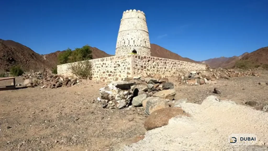 Restored stone watchtower at the Wadi Al Helo heritage village