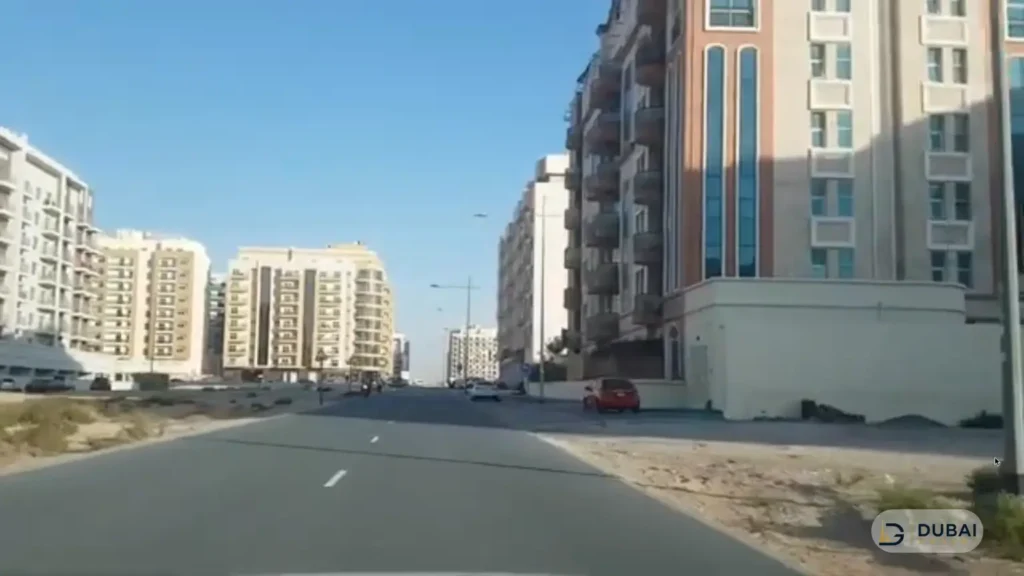 Road through residential blocks in International City Phase 2