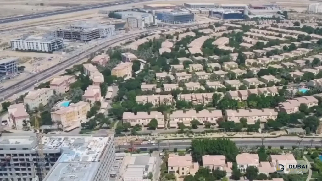 Townhouse rows and landscaped streets in Green Community Village