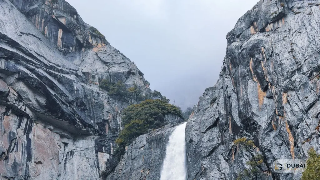 Waterfall between mountain cliffs
